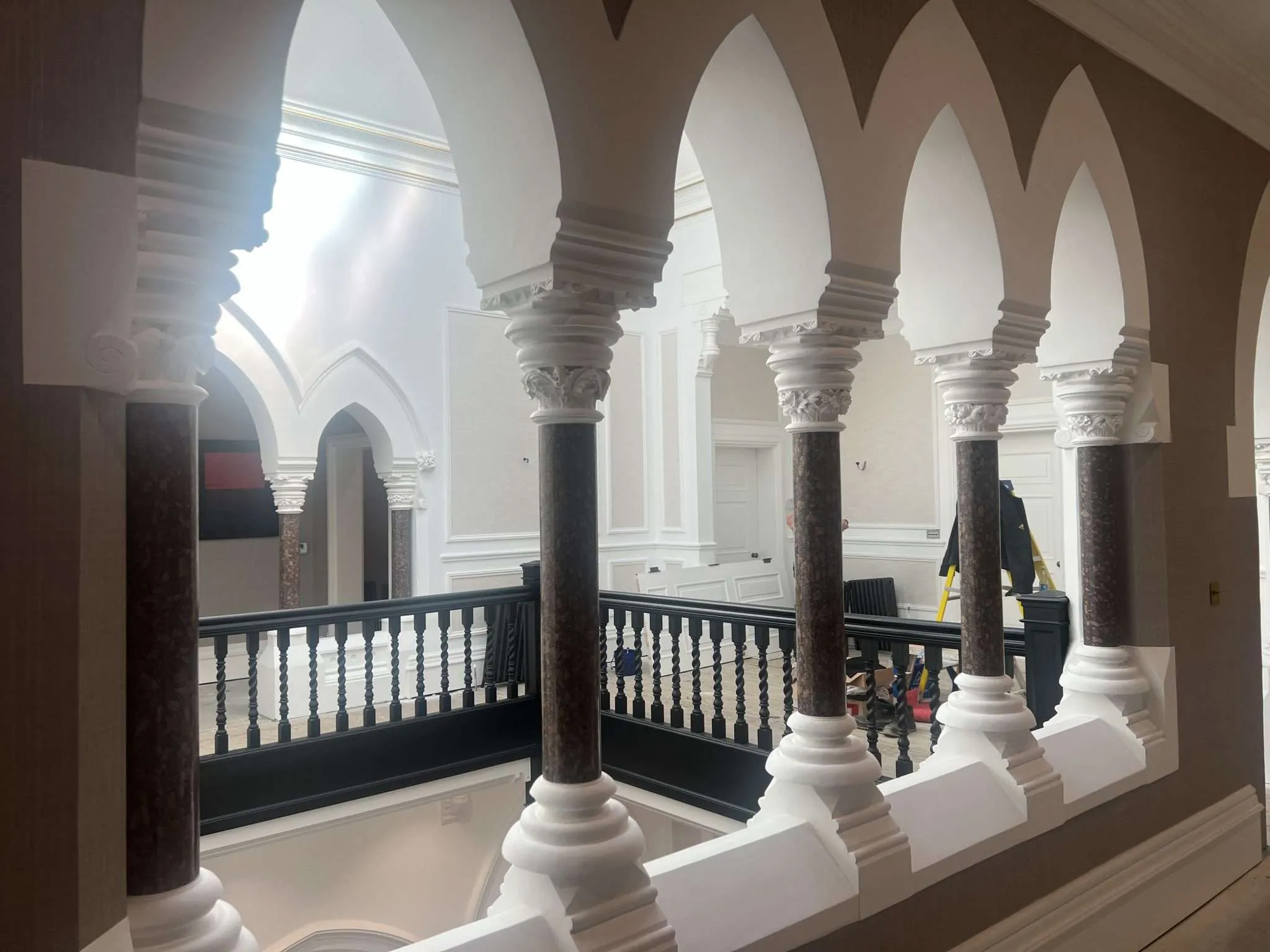 top landing ornate pillars