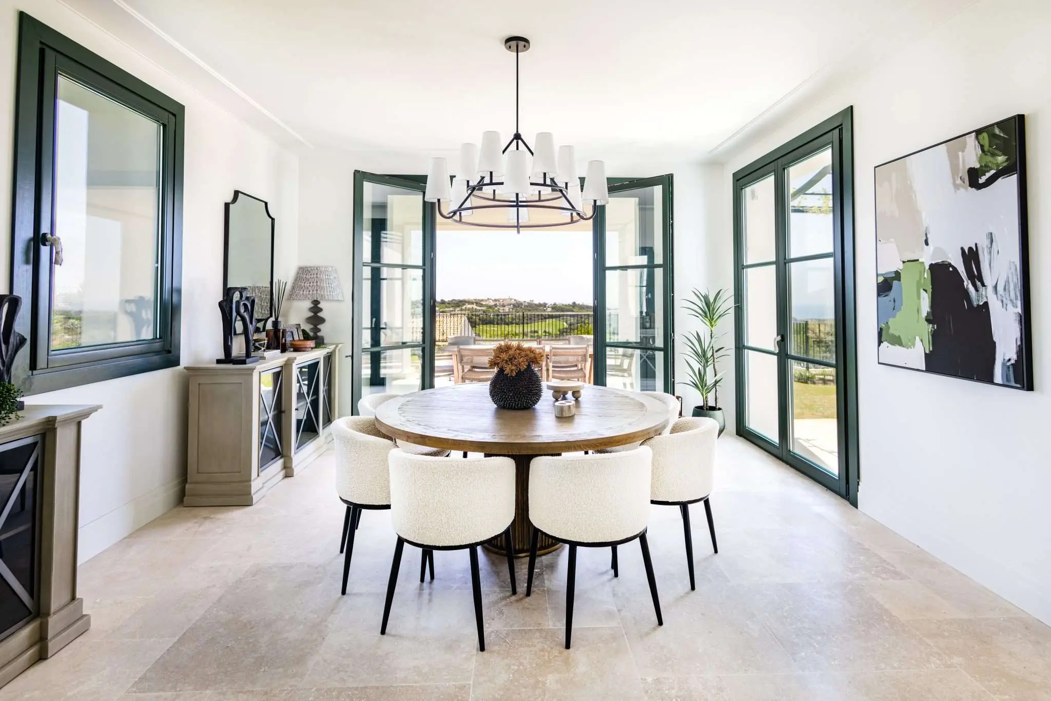 Coastal Finca Spain - dining room round table modern rustic